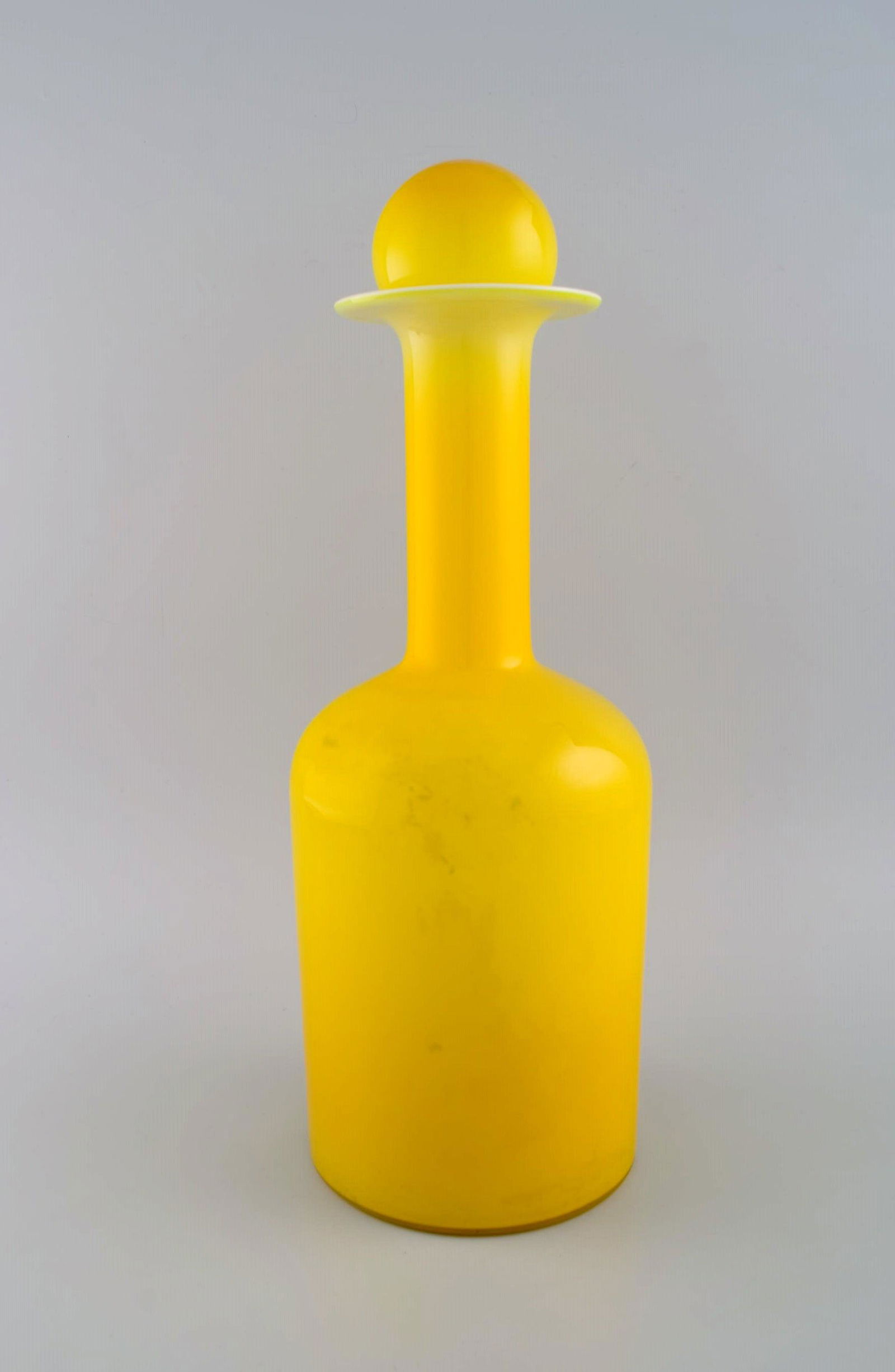 Otto Brauer for Holmegaard. Large vase / bottle in yellow art glass with yellow ball. 1960s.: Title: Otto Brauer for Holmegaard. Large vase / bottle in yellow art glass with yellow ball. 1960s. Description: Otto Brauer for Holmegaard. Large vase / bottle in yellow art glass with yellow ball. 1
