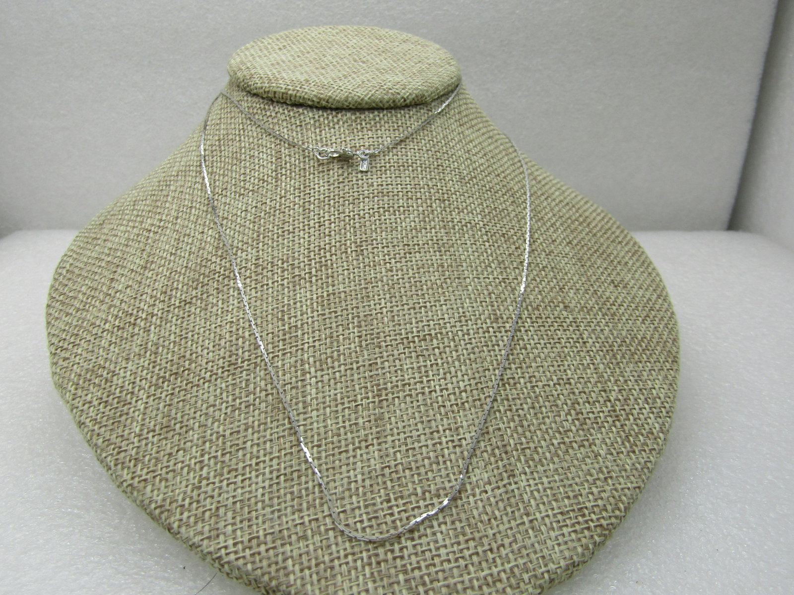Vintage Monet Signed Herringbone 30" Chain, appx. 1mm, 1970's-1980's: Vintage Monet Herringbone 30" Chain, appx. 1mm, 1970's-1980's, great as is or add your own pendant. Very good condition. Monet signed hang tag at lobster-ish style clasp. (INV. W.COV20.6 SS2392 J LD 1