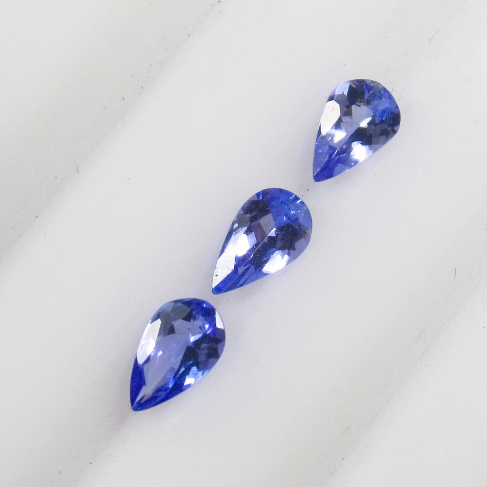 Natural Tanzanite Set - 0.66 Ct: No Reserve! Title: Natural Tanzanite Set - 0.66 Ct Origin: Tanzania Weight: 0.66 Size/Dimensions: 4.8x3.2 - 5.2x3.2 mm Additional Information: Pieces : 3 No's / Shape : Pear Cut / Color : Violet / Cla