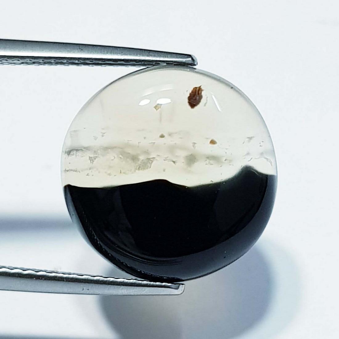 9.94 Ctz Natural Black Lace Agate: No Reserve! Title:9.94 Ctz Natural Black Lace Agate Color/Clarity:Semi Transparent Gemstones:Agate Carat Weights:9.94 Size/Dimensions:15.70 x 15.70 x 5.10 Additional Information:Round / Brazil Shippin
