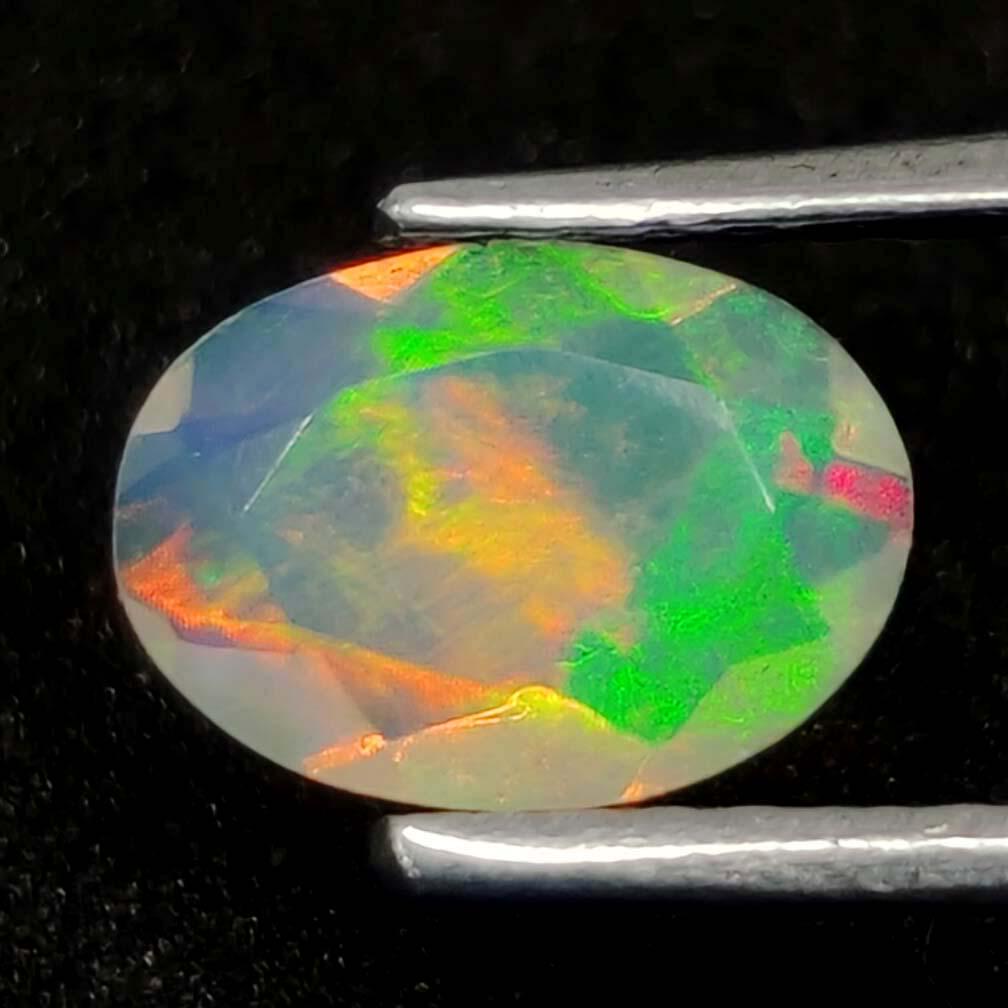 0.45 Ct Natural Ethiopian Multicolor Fire Opal Oval Cut (1 of 3)