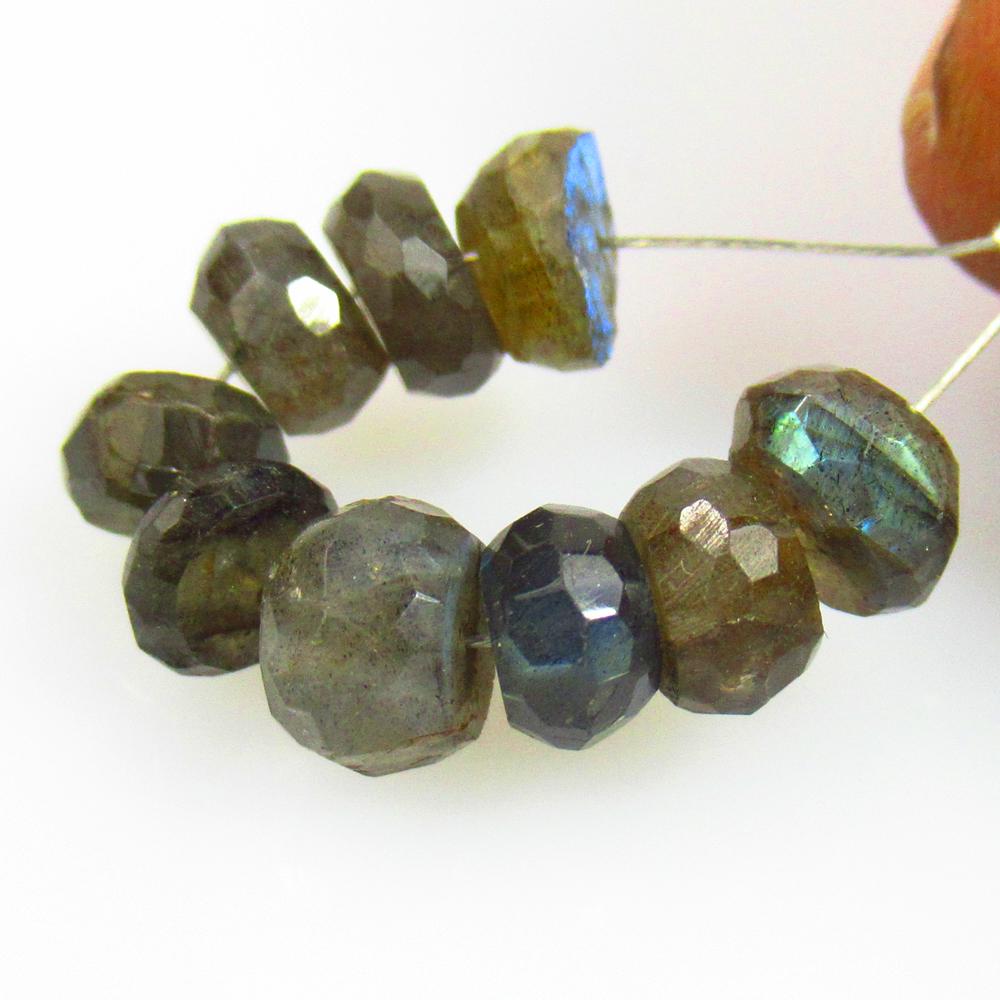 13.21 Ctw Natural 9 Labradorite Round Beads: No Reserve! Title: 13.21 Ctw Natural 9 Labradorite Round Beads Stone Clarity: Opaque Gemstones: Natural Labradorite Beads Carat Weights: 13.21 Size/Dimensions: 6.60 - 7.50 mm / 9 Pc's Additional Infor