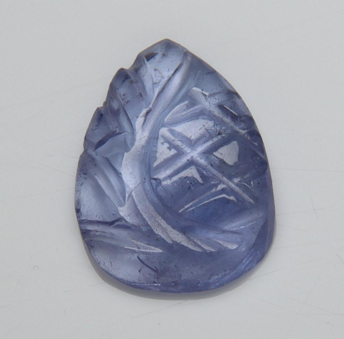 2.01 Cts Natural AAA Tanzanite Carving: No Reserve! Title: 2.01 Cts Natural AAA Tanzanite Carving Description: Gemstone : Natural Tanzanite Carving Origin: Tanzania Weight : 2.01 carats Dimensions : 11x8 mm Shape/Cut: Pear Cut Color : Viole