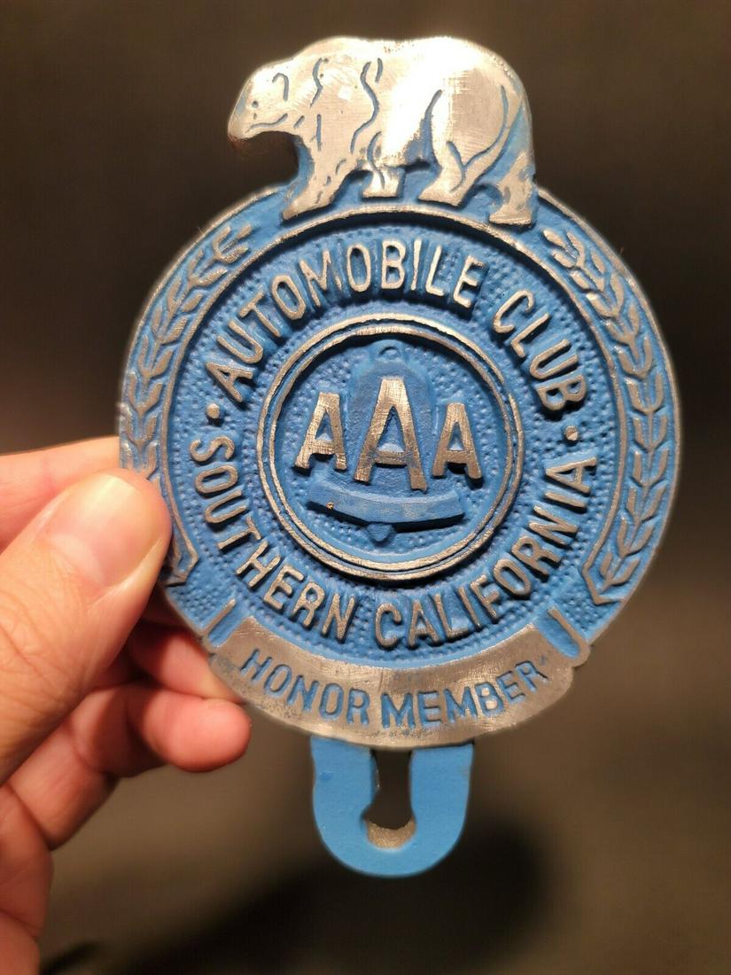 Aluminum AAA Car License Plate Fob Topper: 5" tall x 3 1/4" Wide Wonderful reproduction AAA license plate topper. Good detail cast aluminum hand painted and slightly aged to look like an antique. Certainly hard to tell its age. Reserve: $20.00