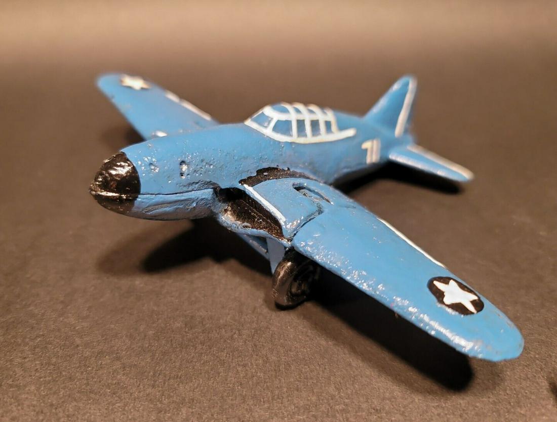 Cast Iron Blue Airplane Toy Plane: 5" long x 6" wide 1 1/2" Tall Great little reproduction cast iron airplane toy. All cast iron hand painted, slightly distress as shown in the images. Certainly looks old! Limited availability! Reserve