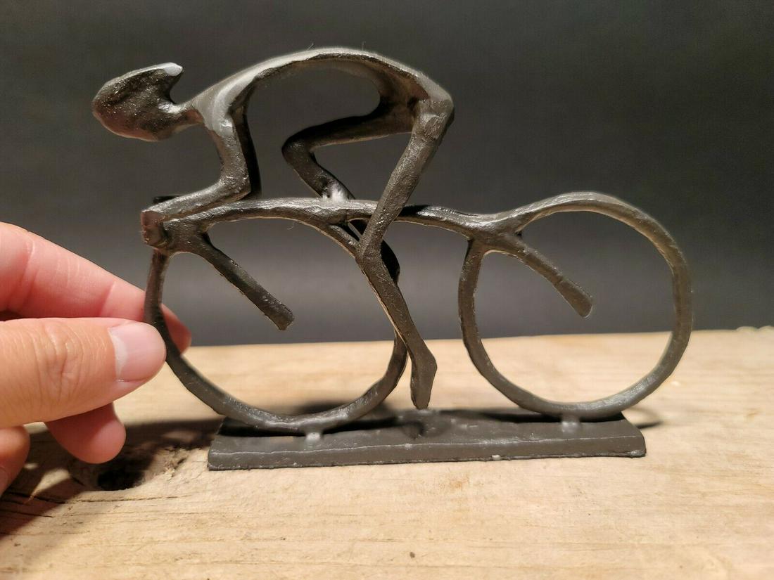 Iron Biking Bike Bicycle Rider Figurine Statue: 6" Long x 4 3/8" Tall Such a charming cast iron bike rider statue. Nice quality! Such a great item for any bicycle riding lover. All solid cast iron Reserve: $25.00 Shipping: Domestic: Flat-rate of $1