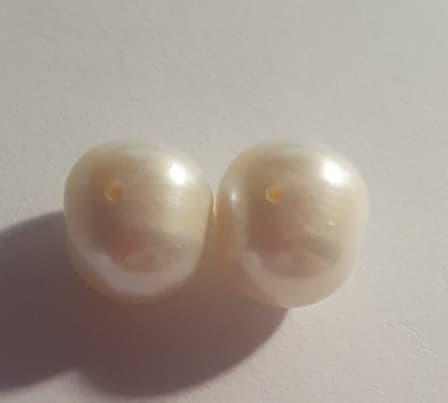 Pair of Natural Pearls Cultured Freshwater Pearls 10mm: 1 x Pair of (2 Pcs) Natural Pearls Cultured Freshwarer Pearls 10mm - Shape: Round - Weight: N/A - Colour: White to Cream - Clarity: N/A - Size: Each piece measures 10mm - Type: Pearls for making Earri
