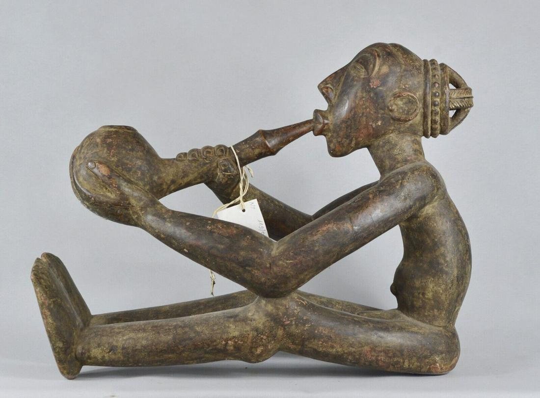 LUBA 47x56cm statue Riamba Cult naked male pipe hemb smoker sculpture Congo: Luba - Congo DRC - 18 1/2 inches - 47 cm (Height) x 22 inches - 56 cm (Length) Rare and imposing sculpture representing a male nude smoking a pipe Probably a hemp smoker, in reference to the Cult of R
