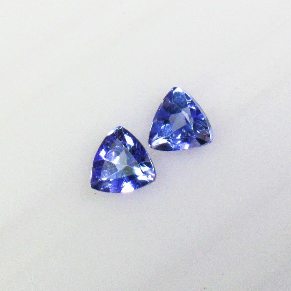 0.26 Ctw Natural Tanzanite Trillion Pair: No Reserve! Title: 0.26 Ctw Natural Tanzanite Trillion Pair Stone Clarity: VVS Gemstones: Natural Tanzanite Carat Weights: 0.26 Size/Dimensions: 3.00 x 3.00 mm / 2 Pc's Additional Information: Top Qua