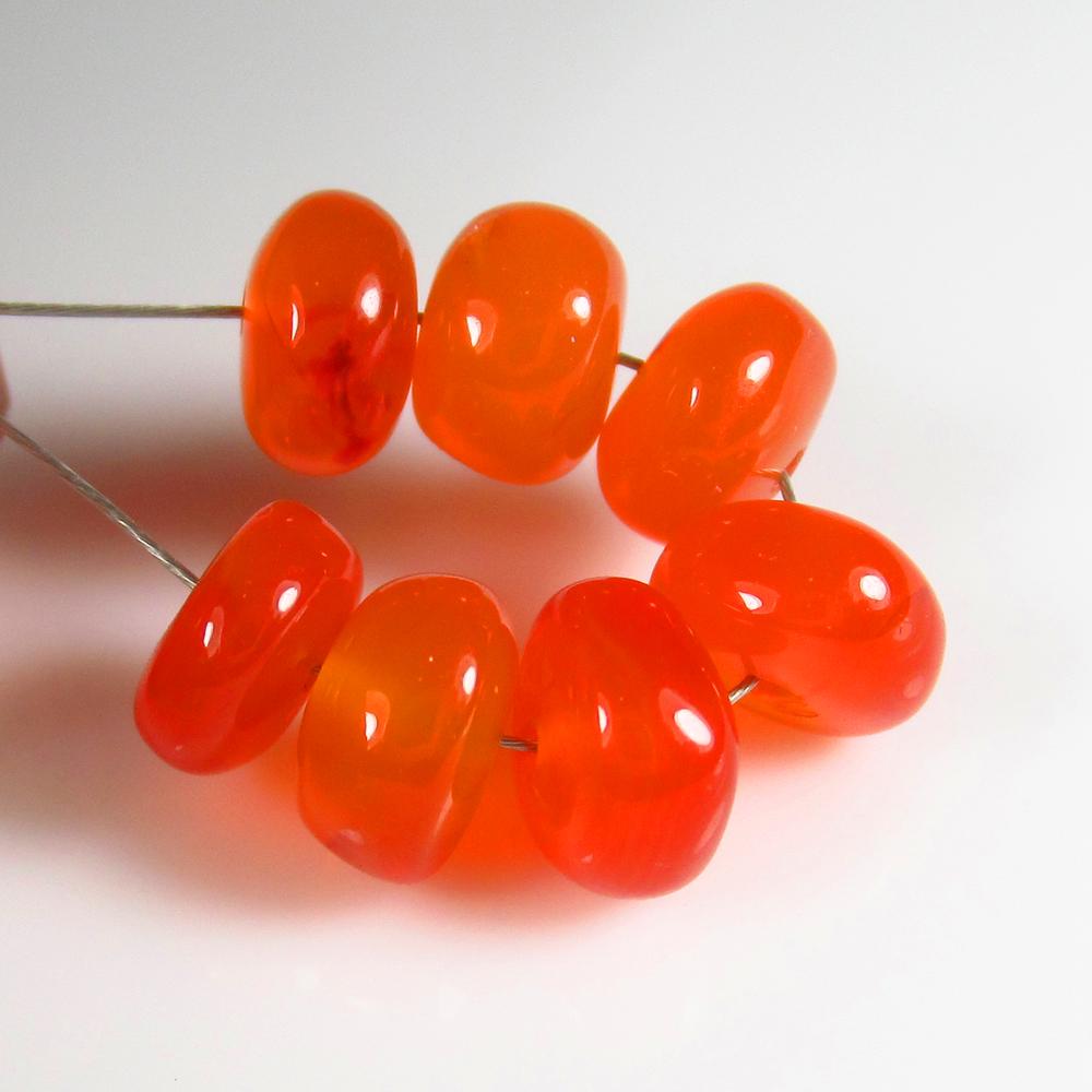 Natural Carnelian Beads - 10.86 Ct: No Reserve! Title: Natural Carnelian Beads - 10.86 Ct Title: Brazil Weight: 10.86 Size/Dimensions: 7.0 x 7.0 mm Additional Information: Pieces : 7 No's / Shape : Drilled Round Beads / Color : Orange /