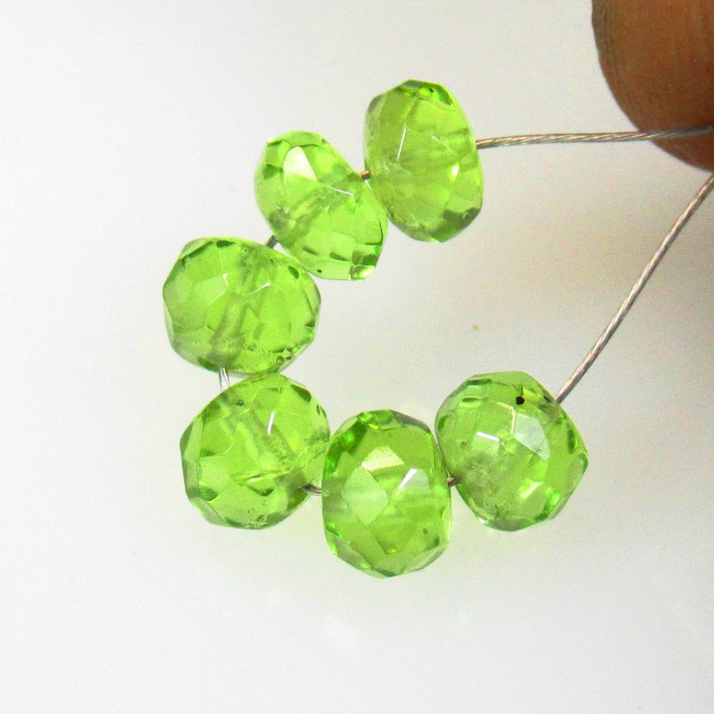 5.72 Ctw Natural 6 Pakistan Peridot Drilled Round Beads: No Reserve! Title: 5.72 Ctw Natural 6 Pakistan Peridot Drilled Round Beads Stone Clarity: Transparent Gemstones: Natural Peridot Beads Carat Weights: 5.72 Size/Dimensions: 5.00 to 5.20 mm / 6 PC's Add
