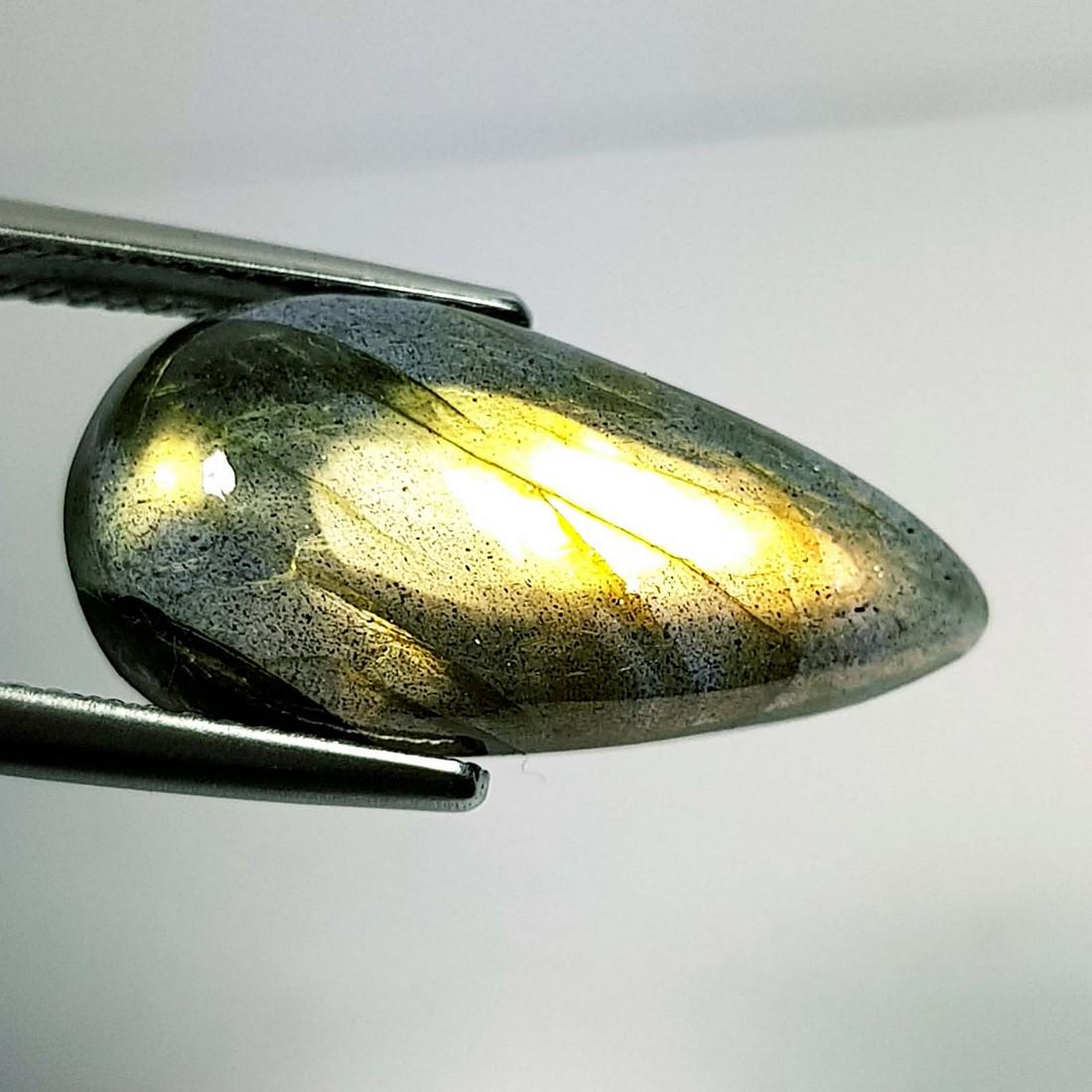 10.97 Ctz Natural Labradorite: No Reserve! Title: 10.97 Ctz Natural Labradorite Color/Clarity: Bluish Green / Semi Transparent Gemstones: Labradorite Carat Weights: 10.97 Size/Dimensions: 22.00 x 11.000 x 6.20 Additional Informatio