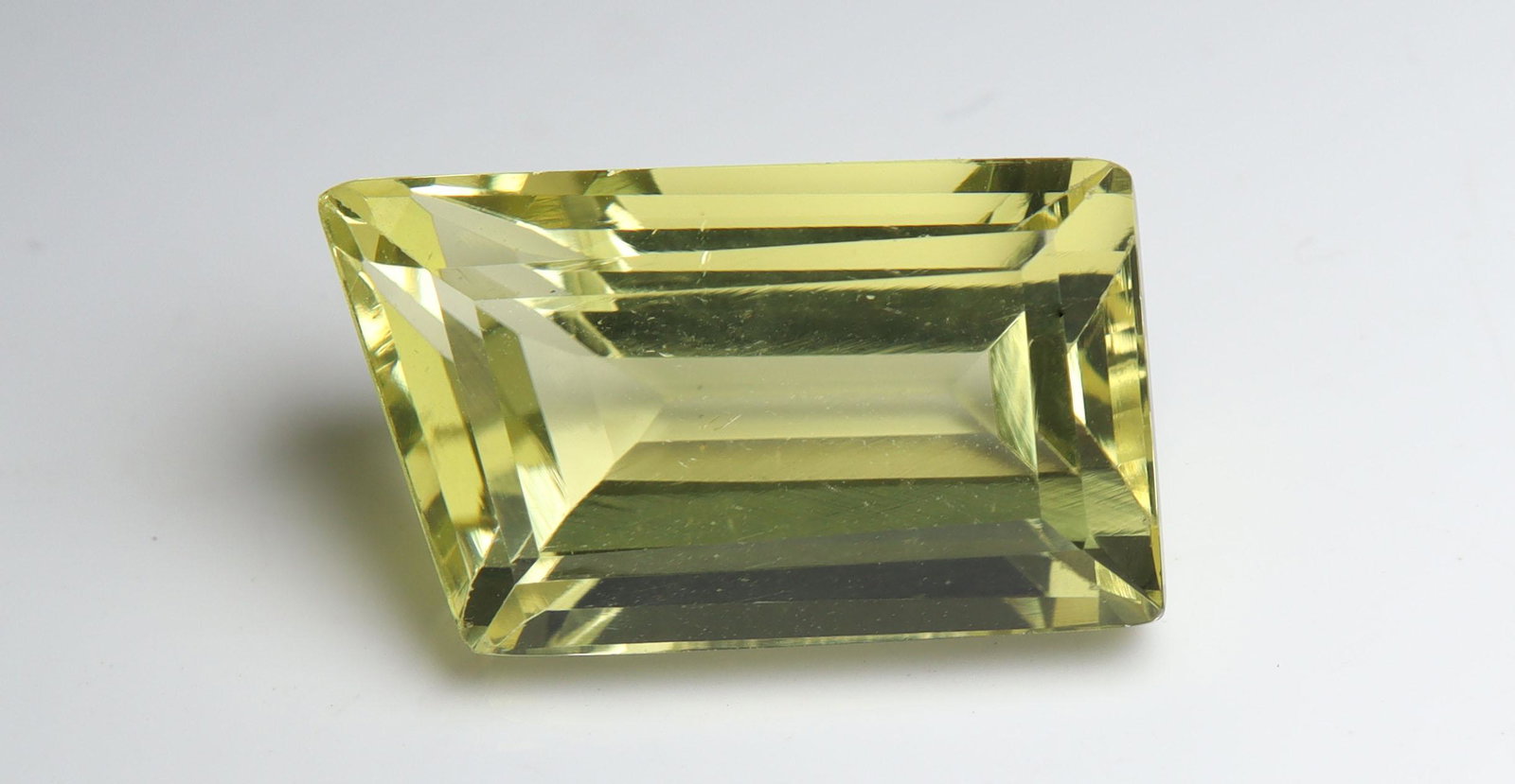 10.91 Cts Natural Lemon Quartz: No Reserve! Title: 10.91 Cts Natural Lemon Quartz Additional Information: Gemstone : Natural LemonQuartz Shape and cut : Fancy Cut Origin : Africa Weight : 10.91 carats Measurements : 17x10 mm Color :