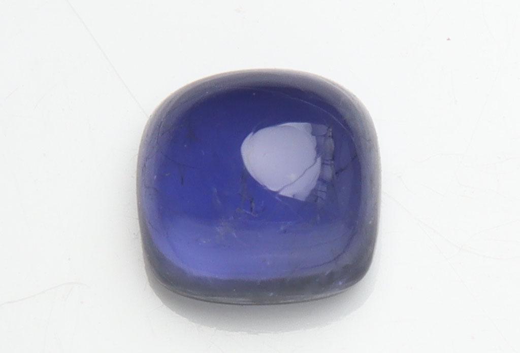 1.32 cts Natural Iolite: No Reserve! Title: 1.32 cts Natural Iolite Additional Information: Gemstone : Natural Iolite Shape and cut : Square Cabochan Weight : 1.32 carats Measurements : 6.48-6.40x3.86 mm , Color : Violite Tra