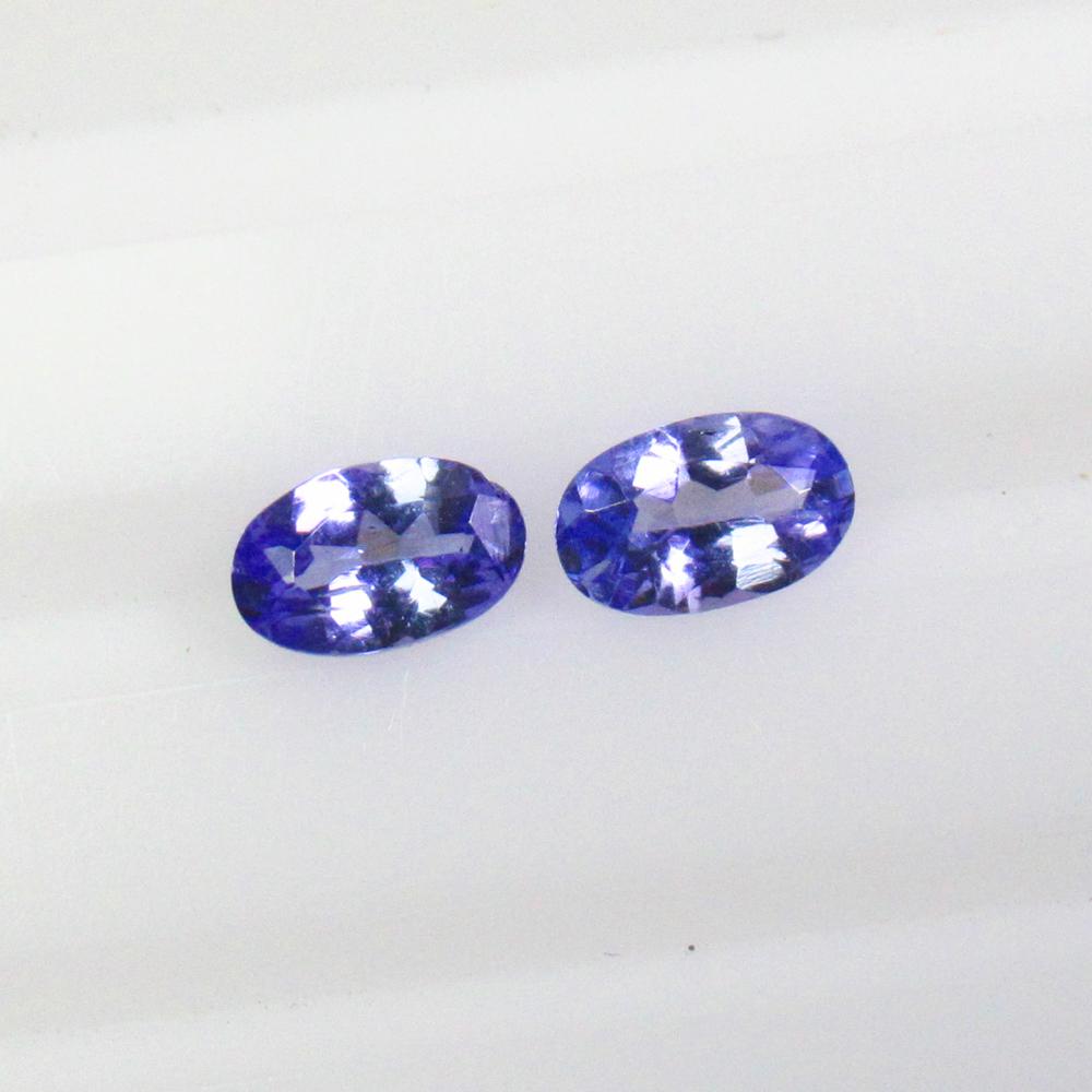 0.50 Ctw Natural Tanzanite Oval Pair: No Reserve! Title: 0.50 Ctw Natural Tanzanite Oval Pair Stone Clarity: VVS Gemstones: Natural Tanzanite Carat Weights: 0.5 Size/Dimensions: 5.00 x 3.00 x 2.00 mm / 2 P'cs Additional Information: Top Q