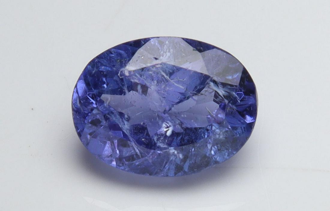 1.50 Cts Natural Tanzanite: No Reserve! Title: 1.50 Cts Natural Tanzanite Additional Information: Gemstone : Natural Tanzanite Origin: Tanzania Weight : 1.50 carats Dimensions : 8x6 Shape/Cut: Oval Cut Color : Violet Transparenc