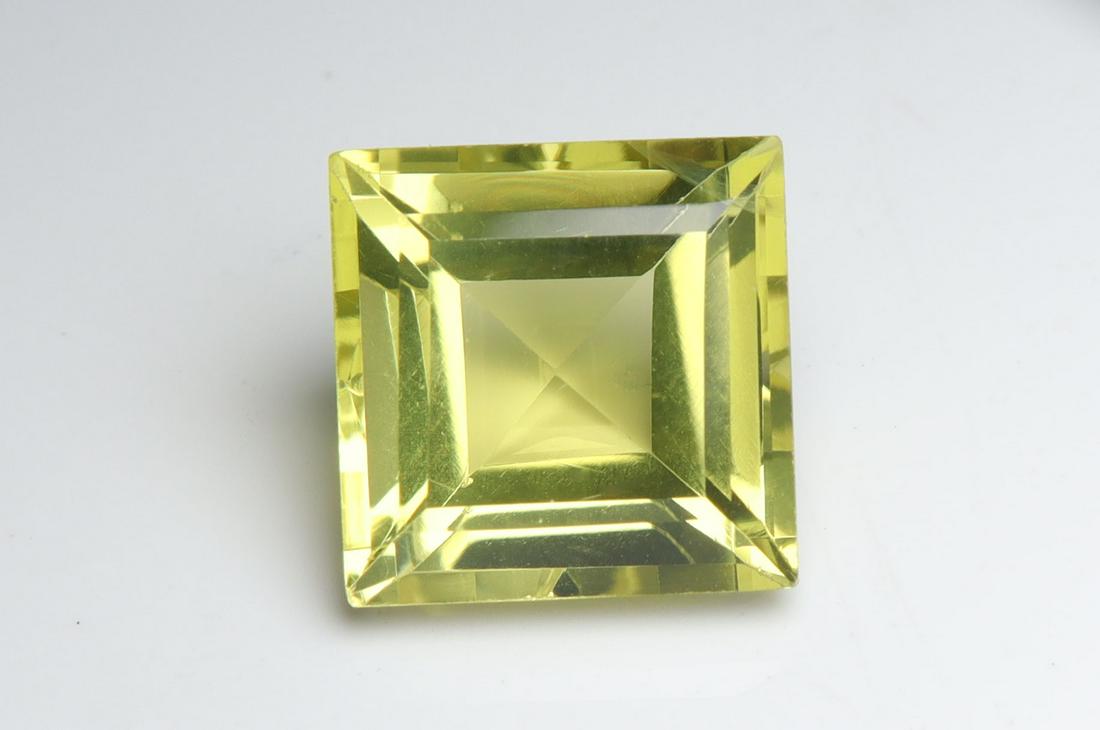 4.91 Cts Natural Lemon Quartz: No Reserve! Title: 4.91 Cts Natural Lemon Quartz Additional Information: Gemstone : Natural Lemon Quartz Shape and cut : Square Cut Origin : Africa Weight : 4.91 carats Measurements : 10x10 mm Color :