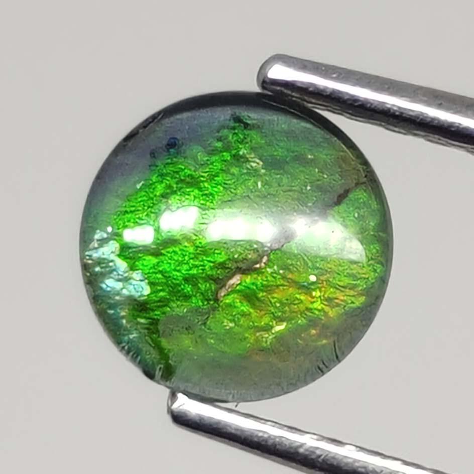 0.75 ct Australian Doublet Opal: No Reserve! Title: 0.75 ct Australian Doublet Opal Additional Information: Gemstones: Australian Doublet Opal Carat Weights: 0.75 ct Size/Dimensions: 6 X 6 mm Materials & Techniques: Doublet Opal Ship