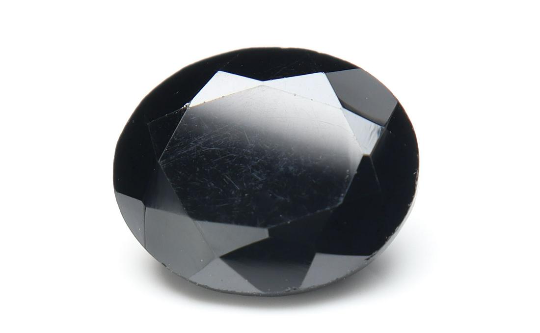 6.73 Cts Natural Black Spinel: No Reserve! Title: 6.73 Cts Natural Black Spinel Additional Information: Gemstone : Natural Black Spinel Shape and cut : Oval Cut Origin : Africa Weight : 6.73 carats Measurements : 14x10 mm , Color :