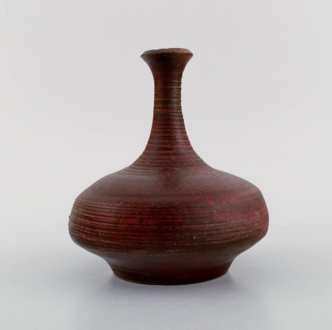 European studio ceramicist. Narrow neck unique vase in glazed stoneware. Beautiful glaze in reddish (1 of 6)