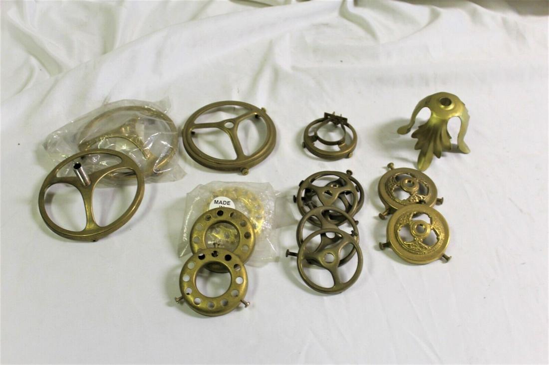 Lighting parts/shade holders new: Verious sizes and designs in solid brass and sizes from mostly 2 1/4" fitter and some 3" . all new/old stock from our lighting manufacturer company now closed . Reserve: $15.00 Shipping: Domestic: Shi