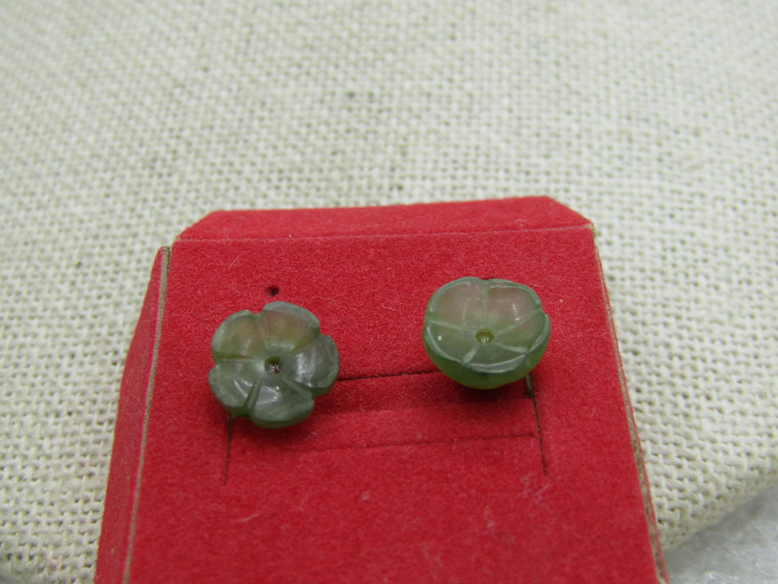 Vintage Jadeite Carved Floral Pierced Earrings, Blossoms NL: Vintage Carved Jadeite Floral Pierced Earrings, Blossoms. These are 1/3" across, gold tone posts and clutches. Like new. Very good condition. Not signed by the maker. (INV. W.1.2620D.4). WB348 NL LD 2