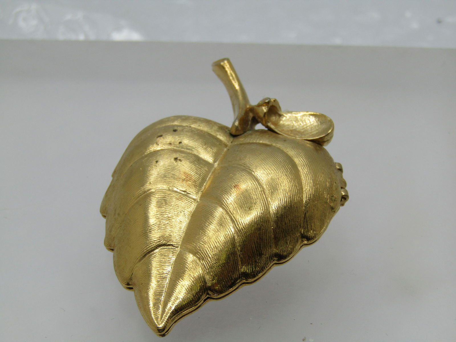 Avon perfume deals brooch