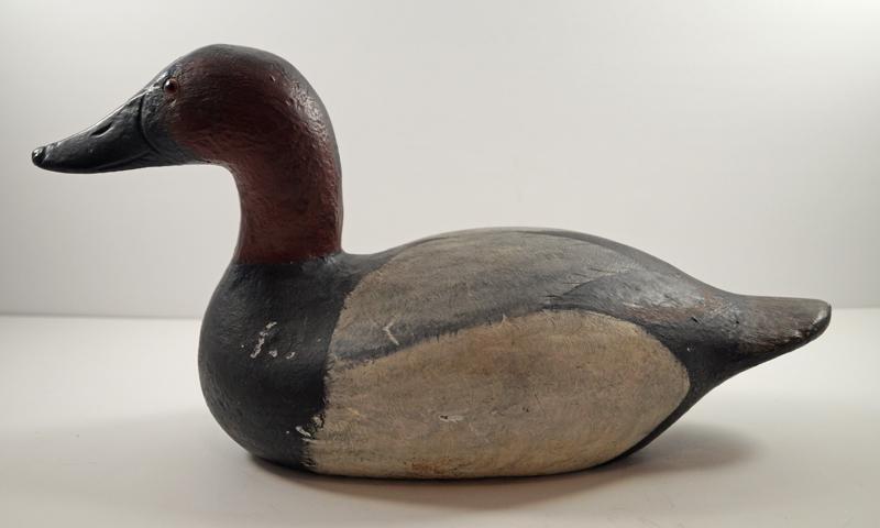 Canvas Back Duck Cast Iron Sink Box Hunting Decoy: Title: Canvas Back Duck Cast Iron Sink Box Hunting Decoy Provenance/Additional Info: Wonderful full-figure casting of a Canvas Back Duck cast iron Sink Box Decoy. Painted in realistic colors with glas