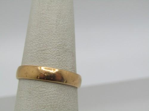 Antique 22kt Gold Band Ring, Sz. 6.75, London: Antique 22kt Gold Band Ring, Sz. 6.75, London. This is appx. 3.5mm wide and believed to be from the earlier 1900's- appx. 1920's. It is a slightly domed ring that has dotted marks but now are somewhat