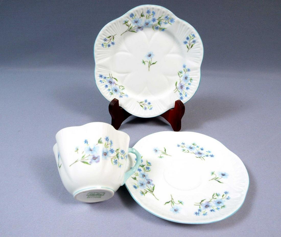 Shelley Blue Rock Dainty Shape Tea Coffee Cup Saucer Plate TRIO 272101: This is a beautiful and timeless Fine Bone China Tea/Coffee Cup, Saucer and Dessert Plate TRIO, made by Shelley England in Blue Rock pattern. The set is in the Shelley famous Dainty shape with blue ri