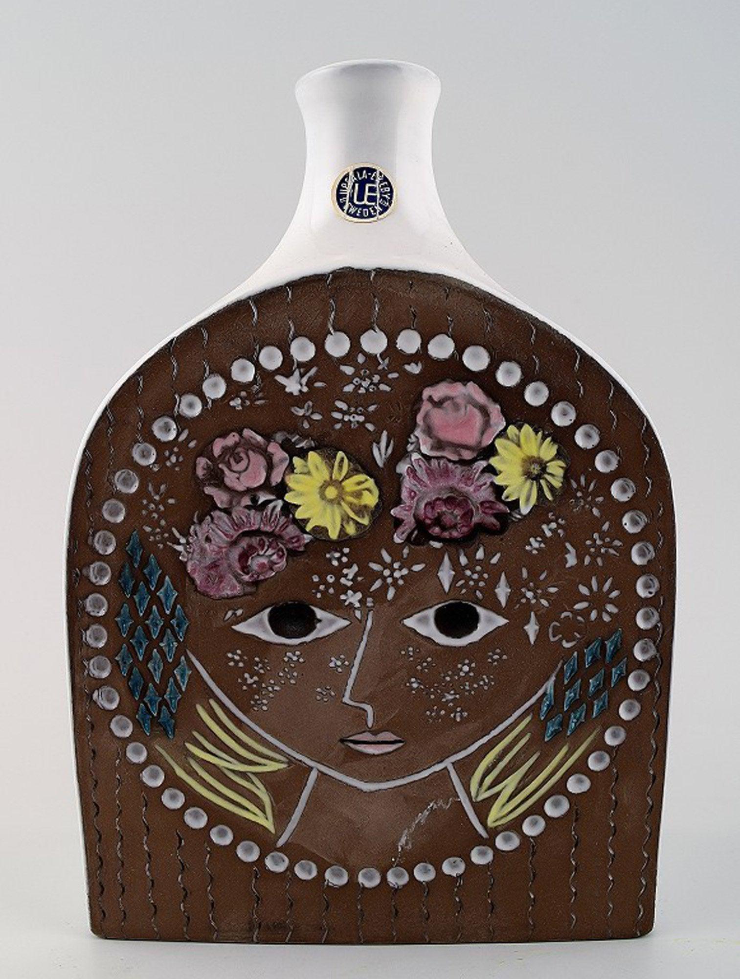 Mari Simulson vase in ceramics. Upsala Ekeby.: Mari Simulson vase in ceramics. Upsala Ekeby. Signed. Decorated with a female face. In perfect condition. Measures 14 cm. Reserve: $70.00 Shipping: Domestic: Shipping rates are determined by destinati
