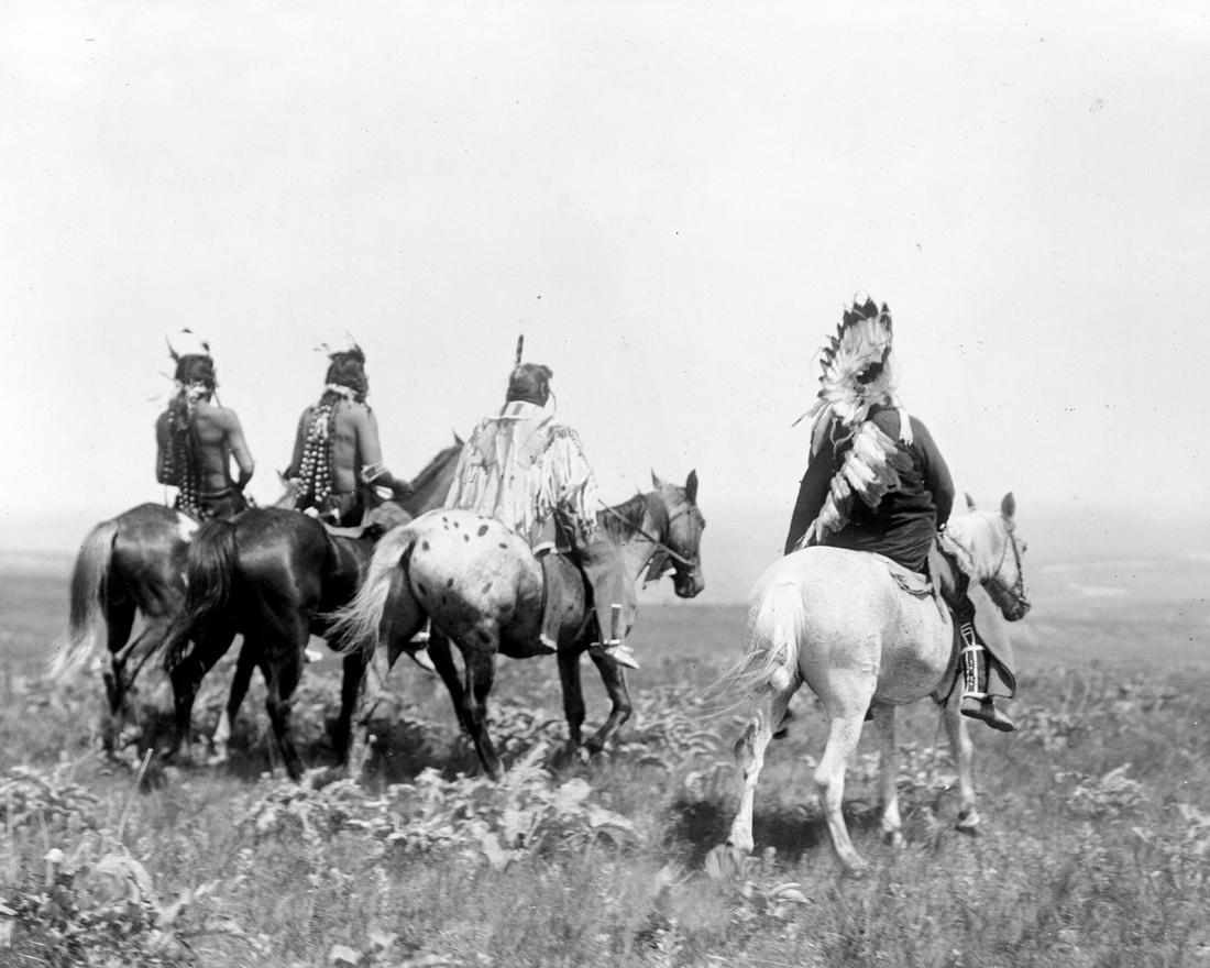 1905, APSAROKE INDIAN CHIEF AND STAFF, BY EDWARD S. CURTIS (1 of 2)