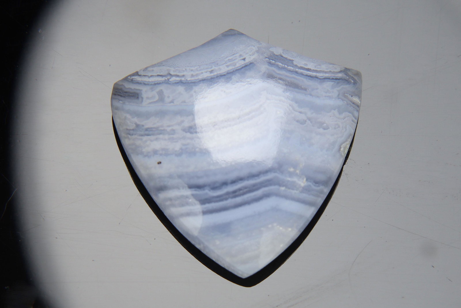 20.14 Ct Natural Blue Lace Agate: No Reserve! Title: 20.14 Ct Natural Blue Lace Agate Additional Information: Gemstone : Natural Blue Lace Agate Shape and cut : Trillion Cabochon Origin : Namibia Weight in carats : 20.14 Measurements 
