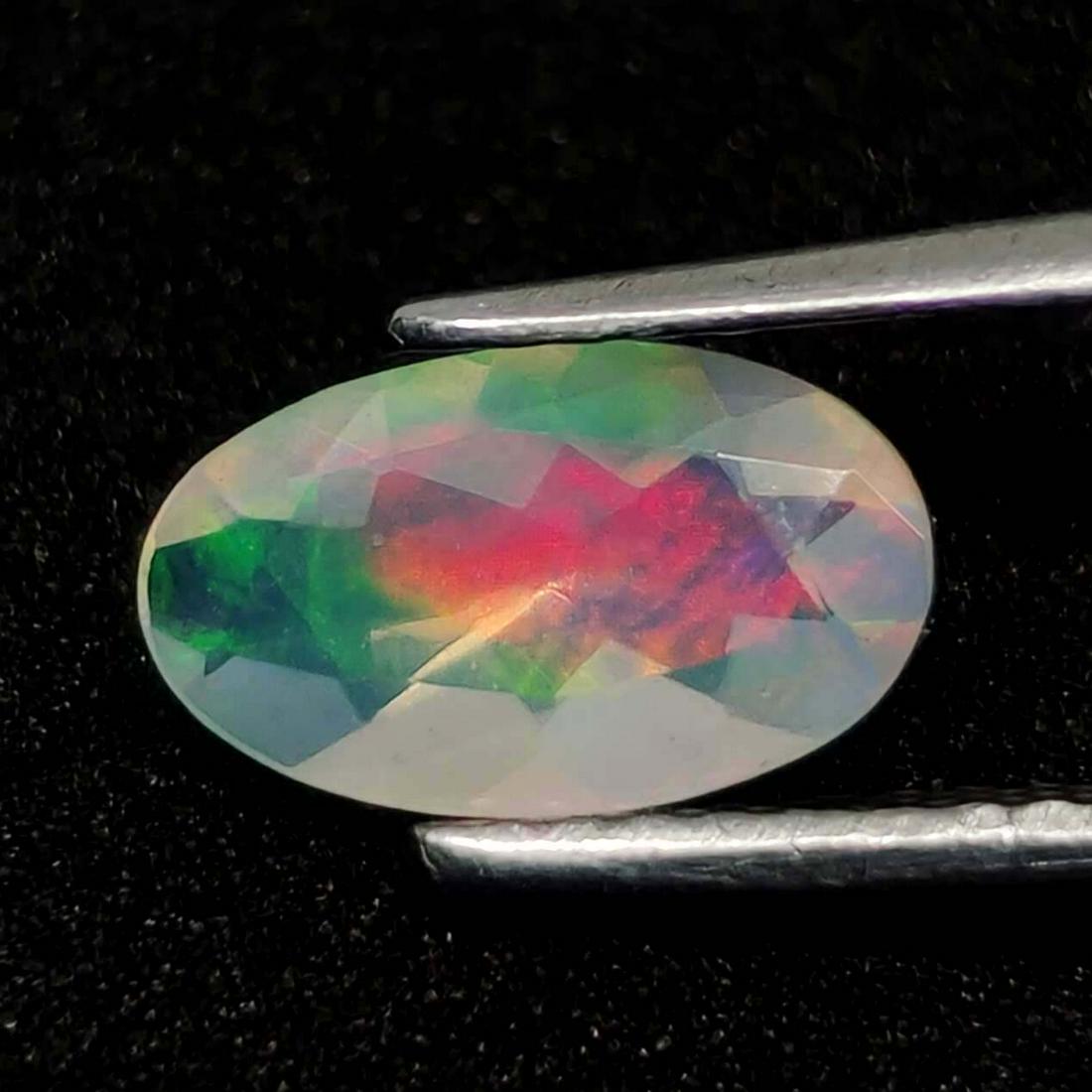 0.70 Ct Natural Ethiopian Multicolor Fire Opal Oval Cut (1 of 2)