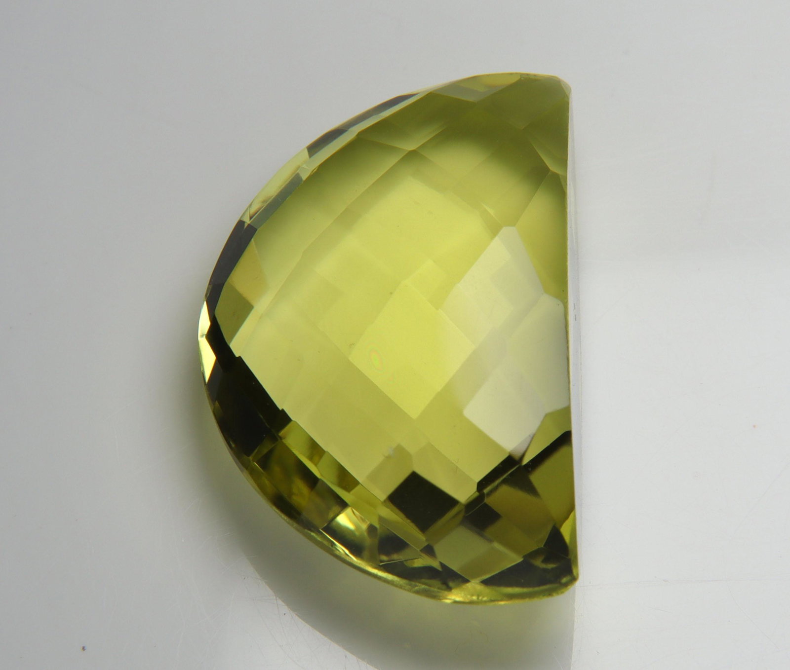 27.50 Cts Natural Lemon Quartz: No Reserve! Title: 27.50 Cts Natural Lemon Quartz Additional Information: Gemstone : Natural Lemon Quartz Shape and cut : Fancy Cut Origin : Africa Weight : 27.50 carats Measurements : 25x16 mm Color 