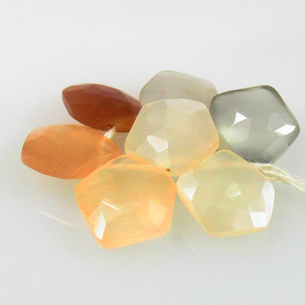 10.85 Ctw Natural 7 Moonstone Fancy Beads: No Reserve! Title: 10.85 Ctw Natural 7 Moonstone Fancy Beads Stone Clarity: Translucent Gemstones: Natural Moonstone Beads Carat Weights: 10.85 Size/Dimensions: 8.2x8.0 - 8.7x8.3 mm / 7 Pc's Additiona