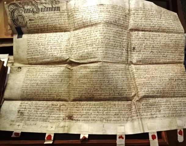 1713 English Vellum Deed Reign Queen Anne: Large English vellum deed dated 1713 during the reign of Anne being the conveyance of property in Helpringham in the county of Lincoln between members of the Blackstock family. Six vellum seal tags wi