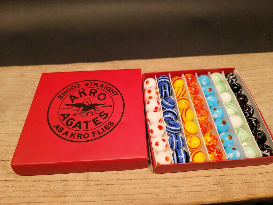 Akro Agates Marble set w Box: 5/8" Marbles as shown. Wonderful reproduction set of marbles . Great Set! Reserve: $25.00 Shipping: Domestic: Flat-rate of $6.00 to anywhere within the contiguous U.S. International: Foreign shipping