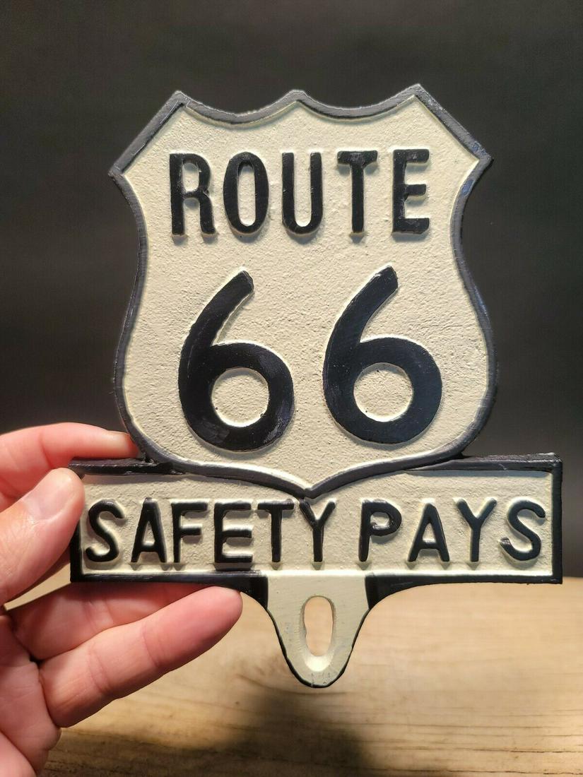 Aluminum Route 66 Safety License Plate Fob Topper: 7" tall x 5 3/4" wide Wonderful reproduction safety license plate topper. Good detail aluminum, slightly aged to look like an antique. Certainly hard to tell its age. Reserve: $30.00 Shipping: Domesti