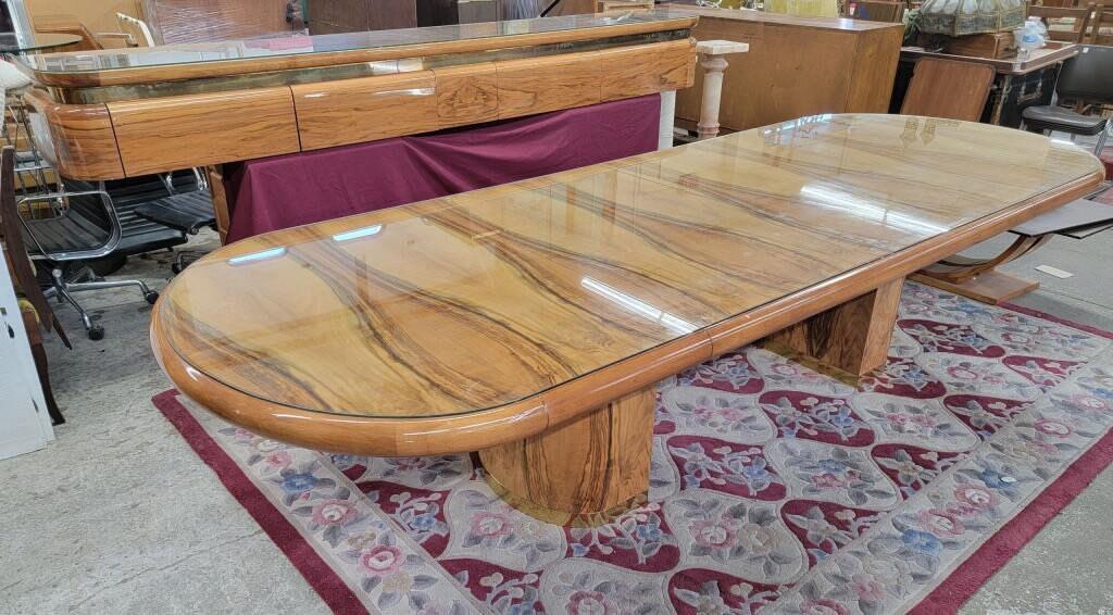 Art Deco French Oval Pedestal Brass Trimmed Dining Table and Floating Sideboard by Ron Seff - 2: Vintage from the 1970s Materials: brass, metal, glass, walnut, wood Description Vintage Art Deco French Walnut Oval Extending Bull-Nose Edge Dual Pedestal Brass Trimmed Dining Table and Floating Sideb