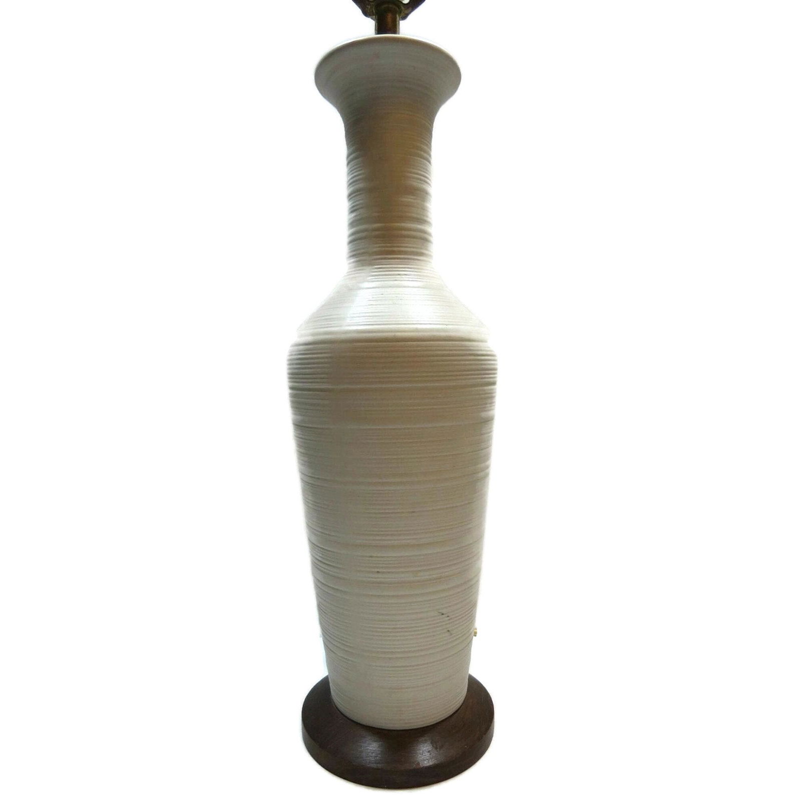 Vintage Mid Century Modern White Cream Danish Table Lamp Antique Walnut Wood: Materials: ceramic, pottery Width: 5 inches Height: 27 inches Description Vintage Mid Century Modern Danish off White Art Pottery Ceramic Lamp Lamp in good working condition with minor wear, it has a