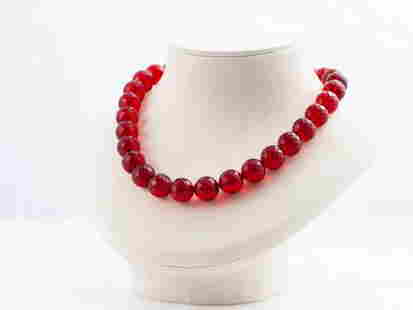 Red Amber Necklace/Collier: Title: Red Amber Necklace/Collier Materials: Red amber Weight: 50.4 Additional Information: Ruby Red amber necklace/collier made of faceted ball beads. Beads dimensions: 14mm/0.55inch. Reserve: $545.0