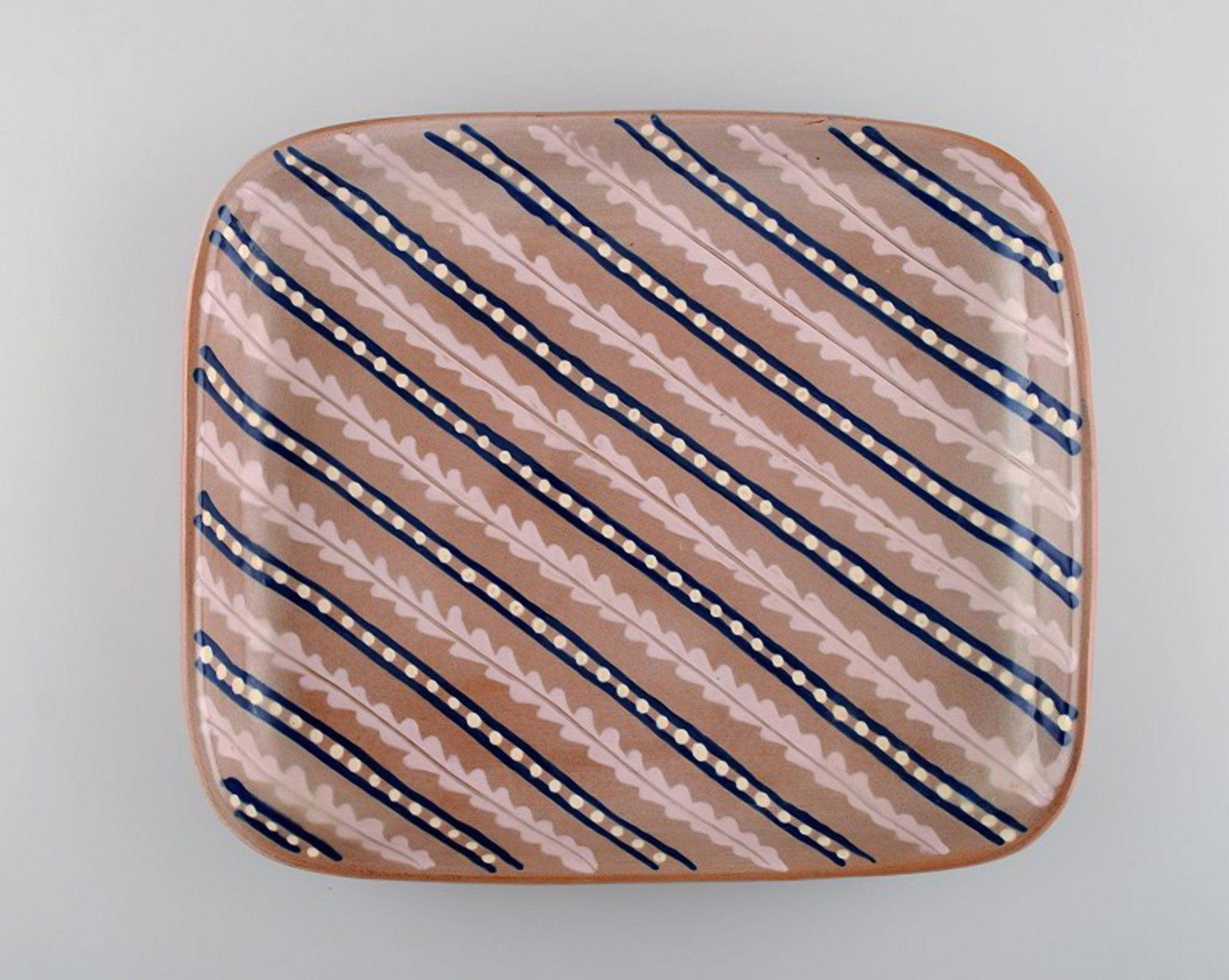 Anna-Lisa Thomson for Upsala-Ekeby. Large dish in glazed stoneware. Striped design. Mid-20th: Anna-Lisa Thomson for Upsala-Ekeby. Large dish in glazed stoneware. Striped design. Mid-20th century. In very good condition. Measures: 30 x 25 cm. Stamped. Reserve: $210.00 Shipping: Domestic: Shippi