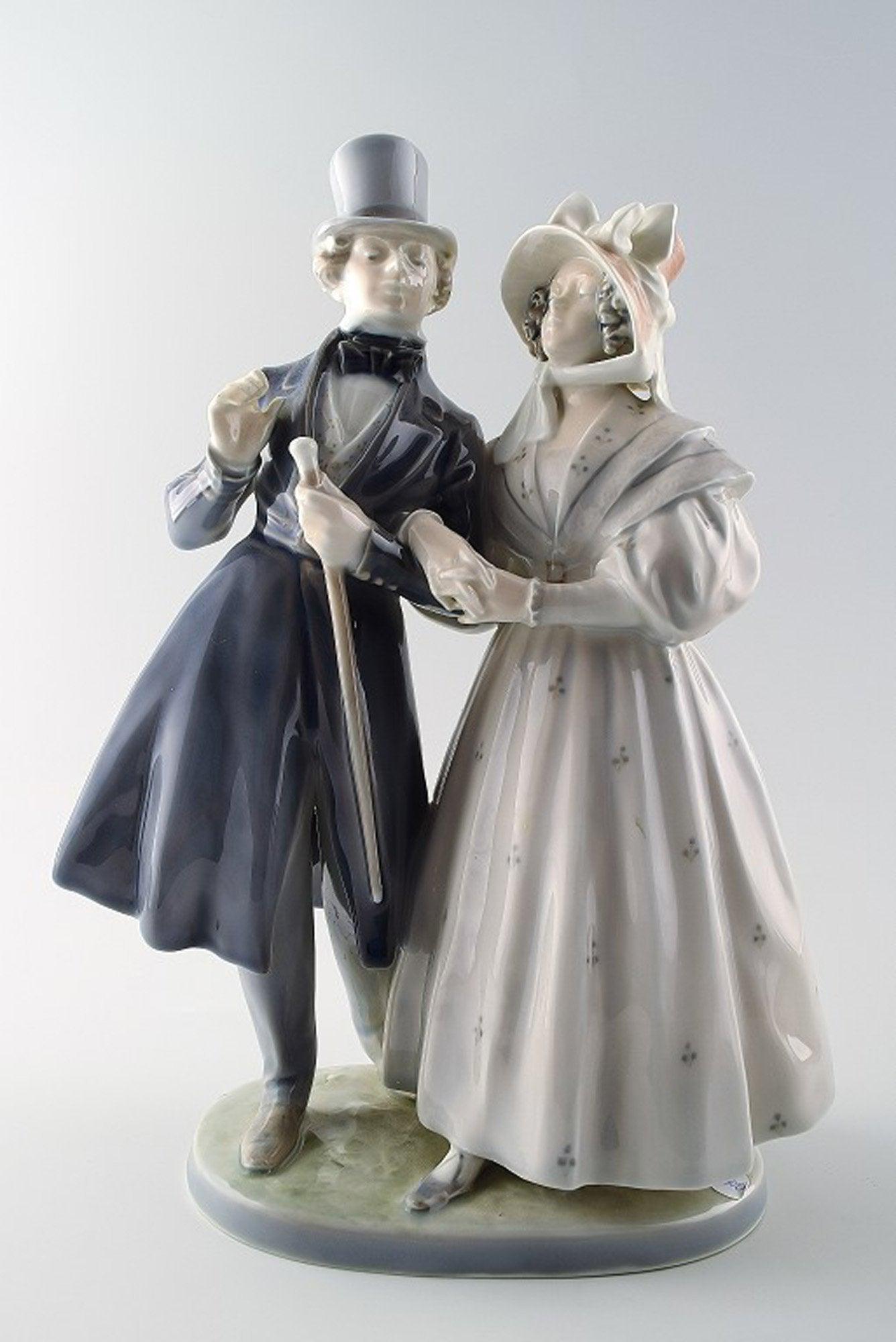 Large Royal Copenhagen figurine, "Evening walk in Tivoli gardens". (1 of 5)