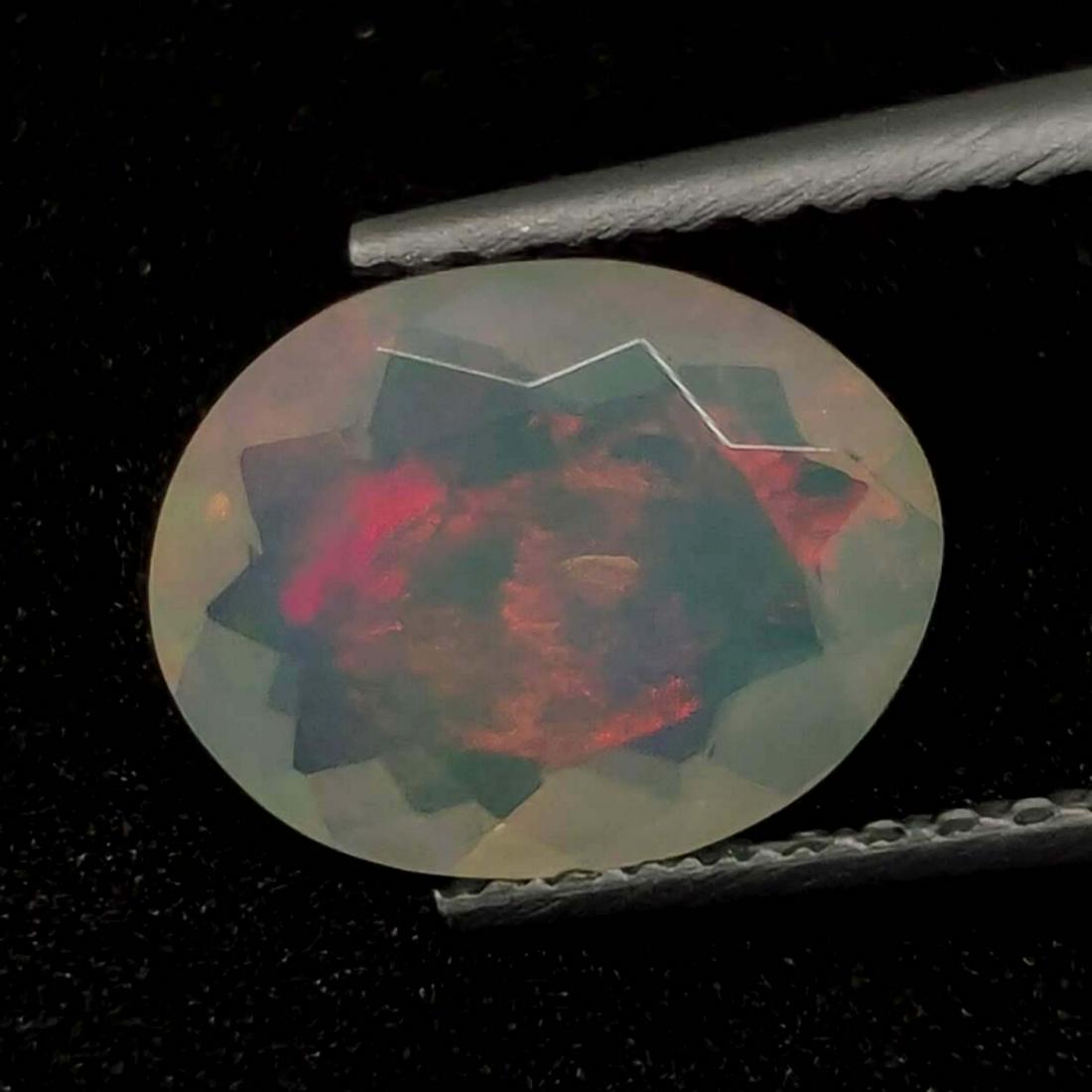 0.90 Ct Natural Ethiopian Multicolor Fire Opal Oval Cut (1 of 2)