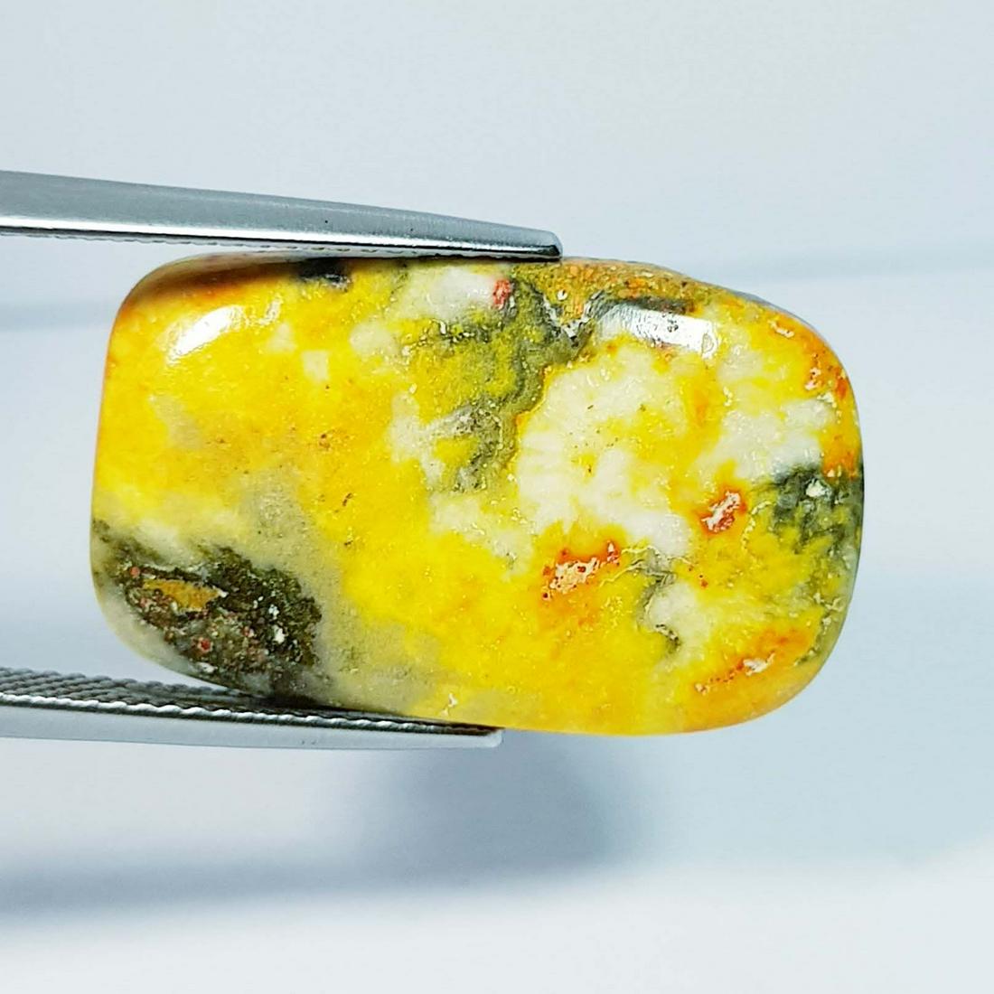 16.44 ctz Natural Bumble Bee Jasper: No Reserve! Title: 16.44 ctz Natural Bumble Bee Jasper Color/Clarity: Yellow / Opaque Gemstones: Jasper Carat Weights: 16.44 Size/Dimensions: 25.60 x 15.80 4.70 Additional Information: Rectangle/ Indo