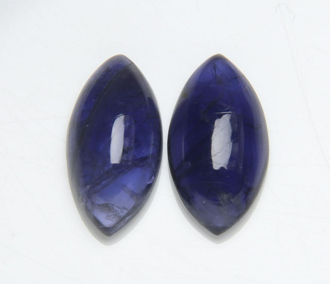 3.72 cts Natural Iolite Set: No Reserve! Title: 3.72 cts Natural Iolite Set Additional Information: Gemstone : Natural Iolite Shape and cut : Marquies Cut Weight : 3.72 carats Measurements : 12.22x6.52x3.33 mm , 12x6 mm Color : V