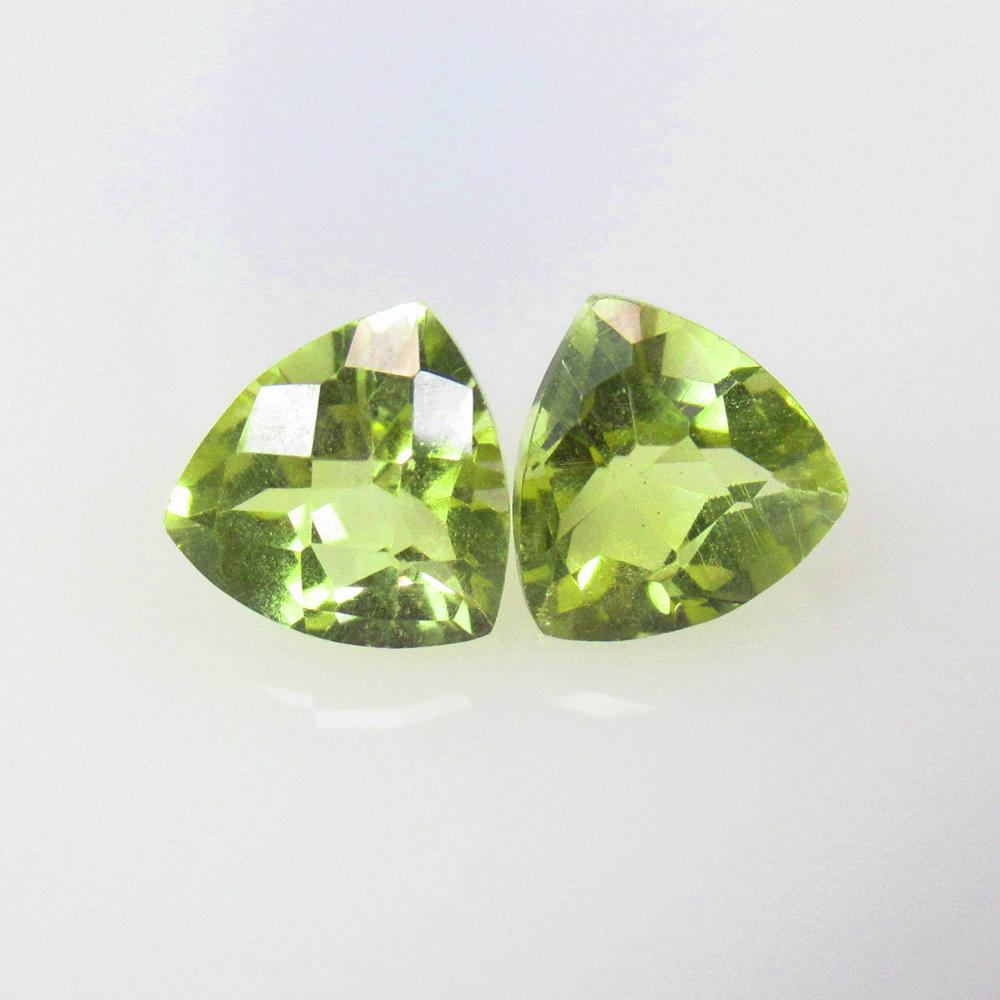 3.92 Ctw Natural Lemon Quartz Trillion Pair: No Reserve! Title: 3.92 Ctw Natural Lemon Quartz Trillion Pair Stone Clarity: VVS Gemstones: Natural Lemon Quartz Carat Weights: 3.92 Size/Dimensions: 8.20 x 8.20 x 5.80 mm / 2 Pc's Additional Informa
