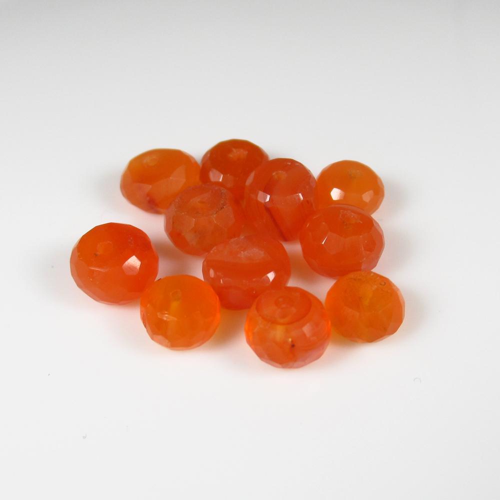 Natural Carnelian Beads - 12.88 Ct: No Reserve! Title: Natural Carnelian Beads - 12.88 Ct Origin: Brazil Weight: 12.88 Size/Dimensions: 6.0 - 7.0 mm Additional Information: Pieces : 11 No's / Shape : Drilled Round Beads / Color : Orange