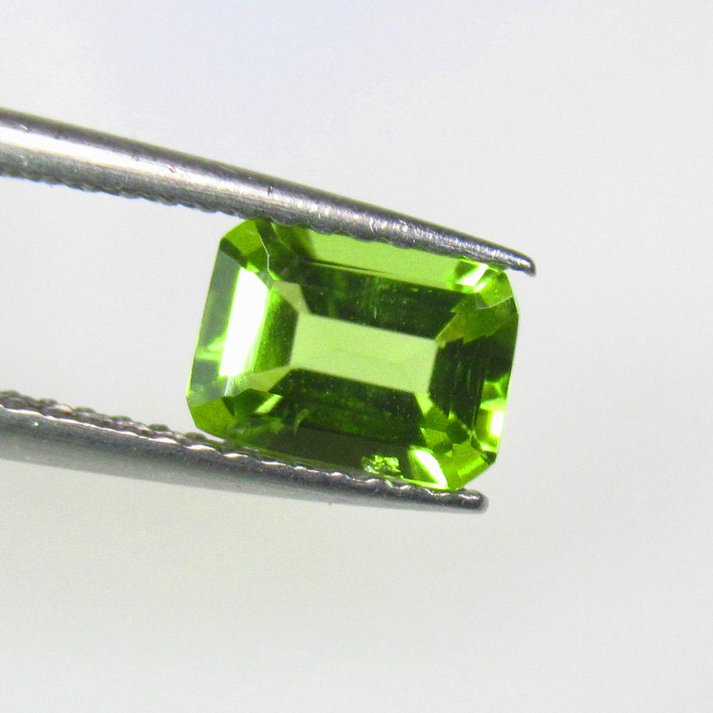 0.95 Ctw Natural Pakistan Peridot Octagon Cut: No Reserve! Title: 0.95 Ctw Natural Pakistan Peridot Octagon Cut Stone Clarity: VVS Gemstones: Natural Peridot Carat Weights: 0.95 Size/Dimensions: 7.00 x 5.00 x 3.20 mm Additional Information: Top Cl